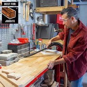 Craftsman CMXZVBE38786 graphics of jobsite vacuum in use cleaning wood workspace.